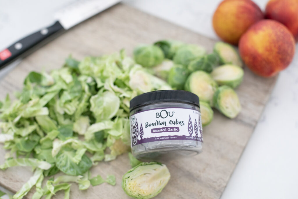 This simple, healthy & refreshingly unique summer shaved brussels sprouts & nectarine salad recipe is sure to wow at your next get together. Garlic marinated shaved brussels sprouts, grilled nectarines, crumbled goat cheese and toasted walnuts with a simple balsamic vinaigrette dressing.