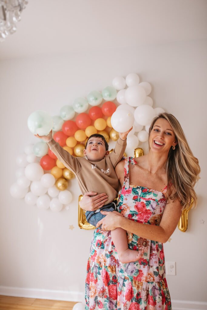 DIY Rainbow Baby Pregnancy Announcement. Rainbow balloon wall pregnancy announcement. Rainbow baby balloon backdrop for photos. Big brother sweatshirt for toddler.