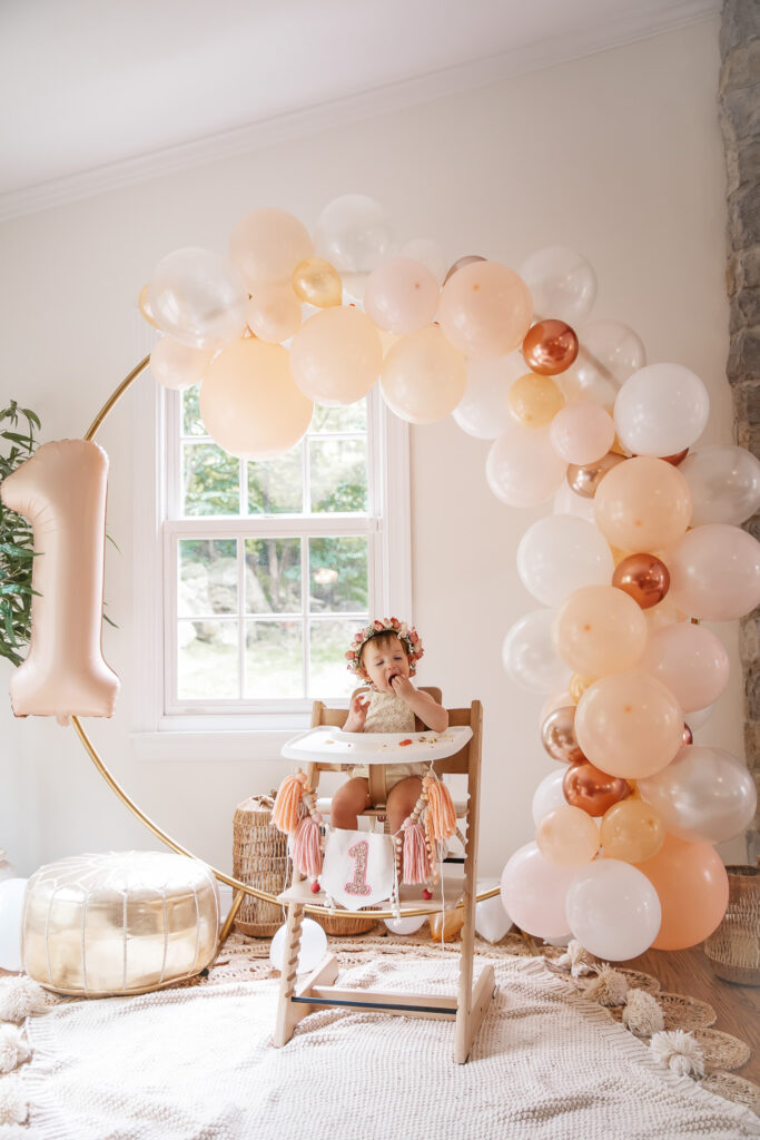 Isn't She ONEderful Boho First Birthday Cake Smash Inspo. Boho baby girl birthday. boho balloon garland. baby girl boho style onesie and flower crown.