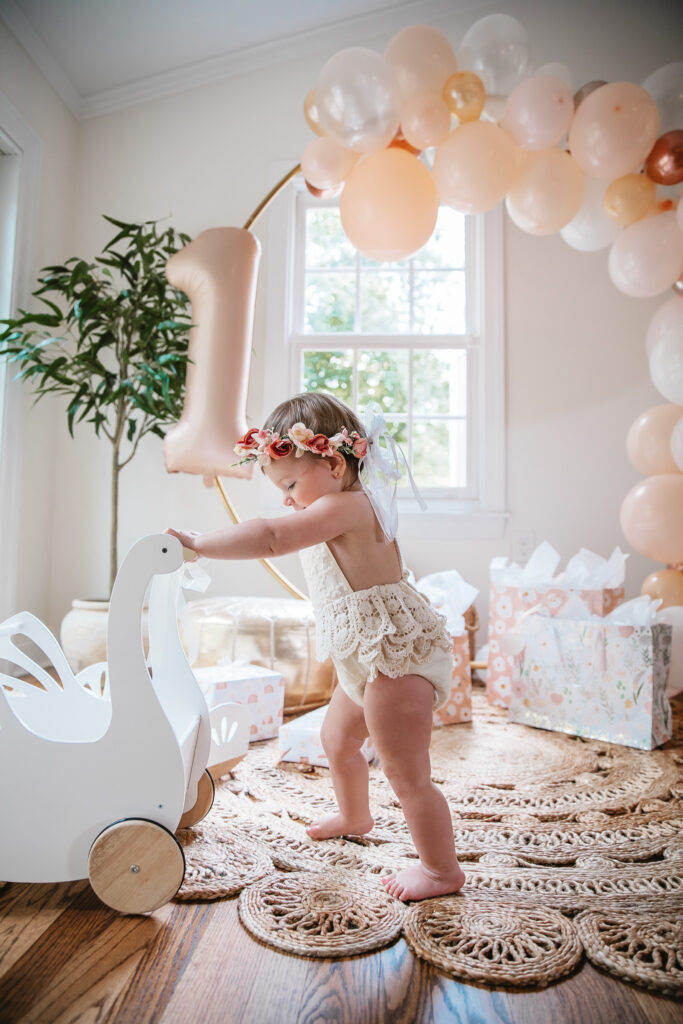 Isn't She ONEderful Boho First Birthday Cake Smash Inspo. Boho baby girl birthday. boho balloon garland. baby girl boho style onesie and flower crown.