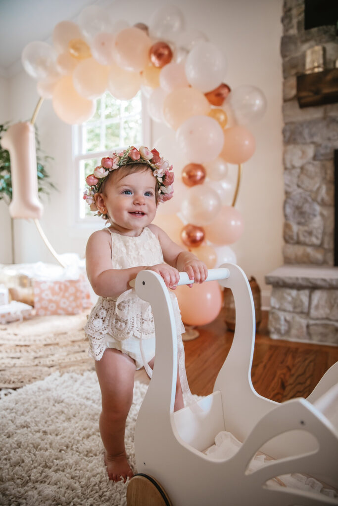 Isn't She ONEderful Boho First Birthday Cake Smash Inspo. Boho baby girl birthday. boho balloon garland. baby girl boho style onesie and flower crown.