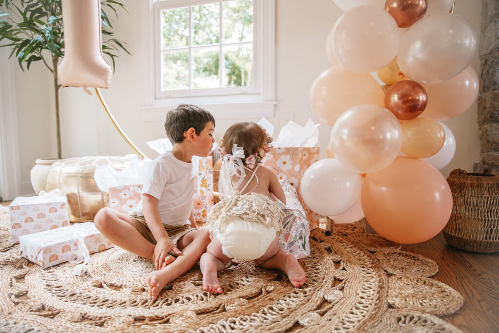 Isn't She ONEderful Boho First Birthday Cake Smash Inspo. Boho baby girl birthday. boho balloon garland. baby girl boho style onesie and flower crown.