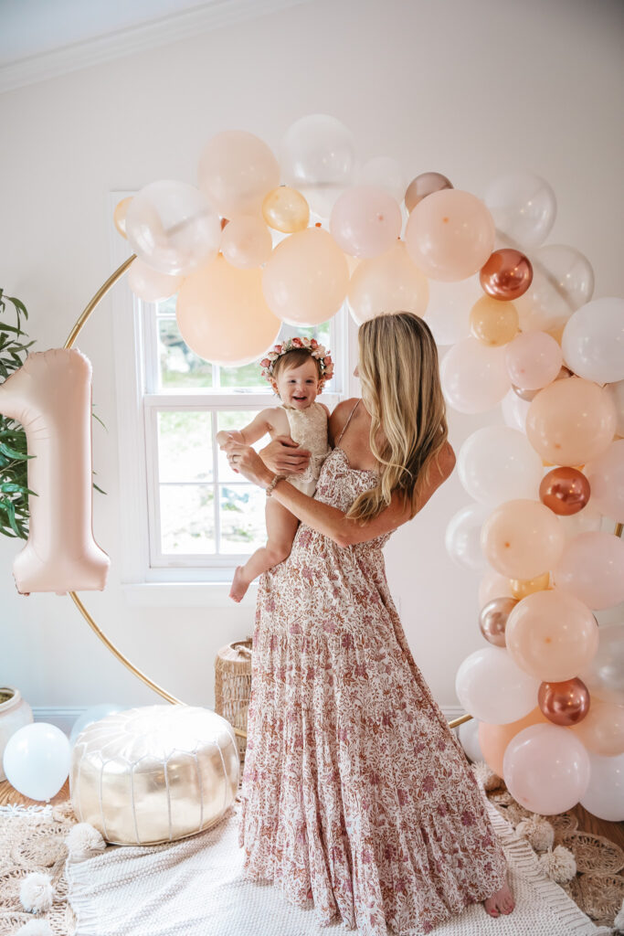 Isn't She ONEderful Boho First Birthday Cake Smash Inspo. Boho baby girl birthday. boho balloon garland. baby girl boho style onesie and flower crown.