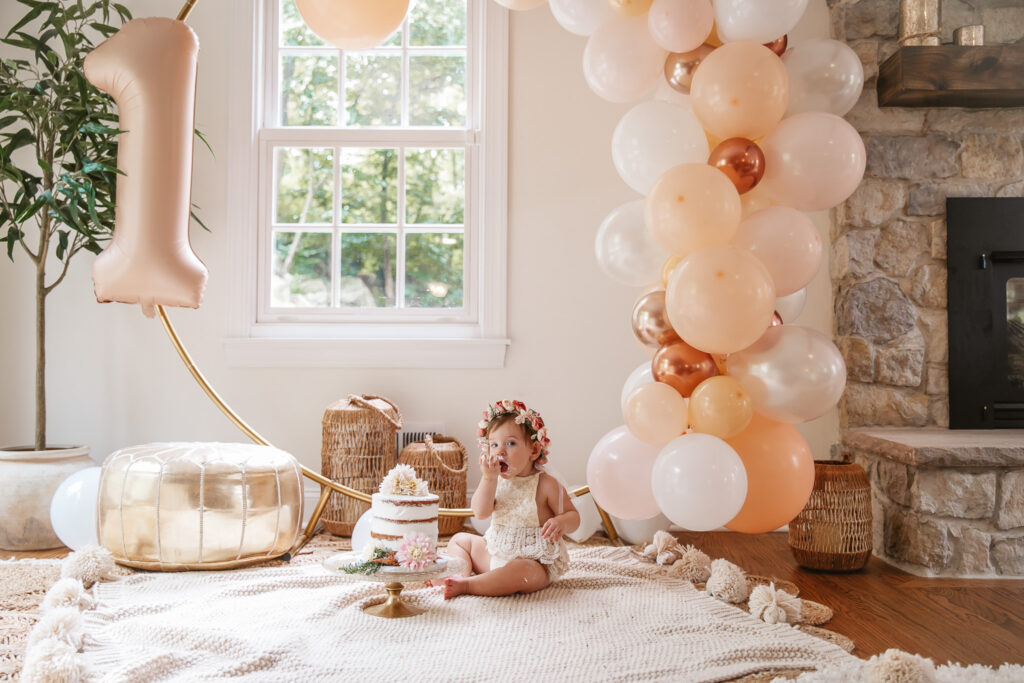 Isn't She ONEderful Boho First Birthday Cake Smash Inspo. Boho baby girl birthday. boho balloon garland. baby girl boho style onesie and flower crown.