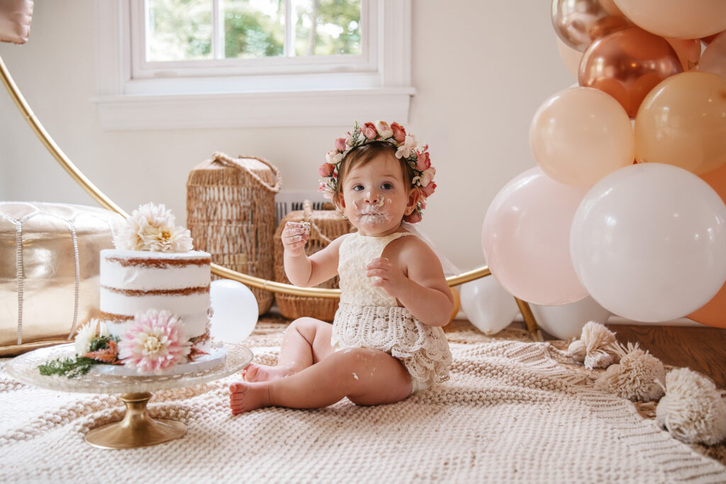 Isn't She ONEderful Boho First Birthday Cake Smash Inspo. Boho baby girl birthday. boho balloon garland. baby girl boho style onesie and flower crown.