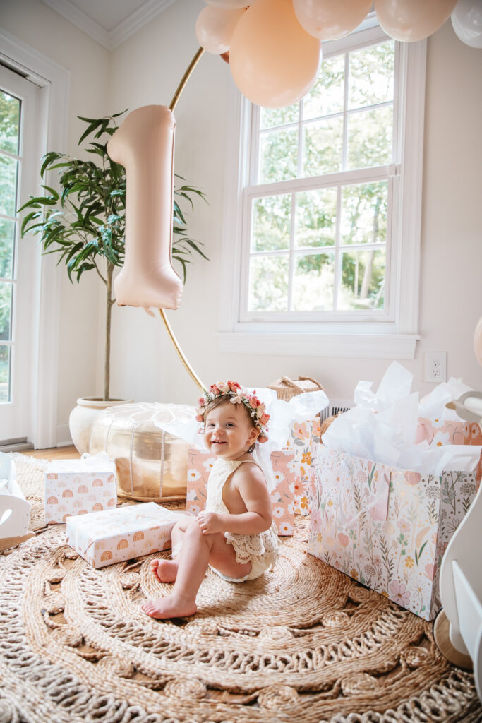 Isn't She ONEderful Boho First Birthday Cake Smash Inspo. Boho baby girl birthday. boho balloon garland. baby girl boho style onesie and flower crown.